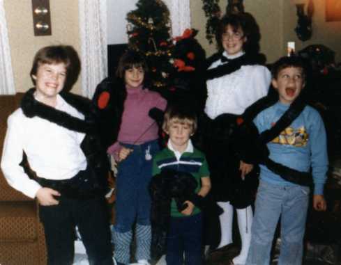 My cousins, brothers and me with the glasses and "muppet puppets" made by Grandma Marjorie Barber, Christmas 1982.